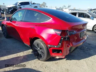 2025 Tesla Model Y Long Range with VIN 7SAYGDED8SF223993, listed as a IAAI auction lot 41743146 with 4,866 mi miles and . Bid and sale history available at DreamBid. Image 3.