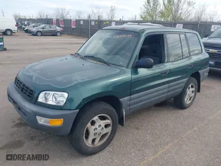 1998 Toyota RAV4 with VIN JT3GP10V5W0026814, listed as a IAAI auction lot 42003456 with 196,842 mi miles. Bid and sale history available at carsss.com. Image 2.
