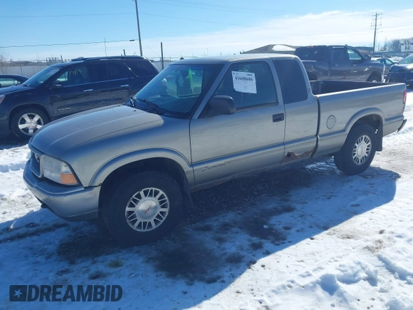 1999 GMC Sonoma SLS with VIN 1GTDT19X9X8531949, listed as a IAAI auction lot 41608606 with 127,664 mi miles. Bid and sale history available at carsss.com. Image 2.