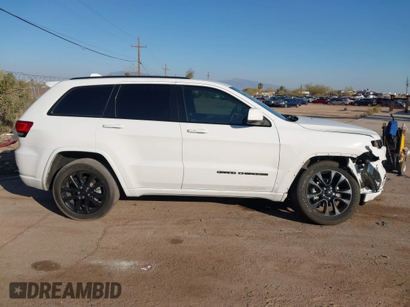 2020 Jeep Grand Cherokee Altitude with VIN 1C4RJEAG1LC251934, listed as a IAAI auction lot 41480299 with 74,169 mi miles and . Bid and sale history available at DreamBid. Image 13.