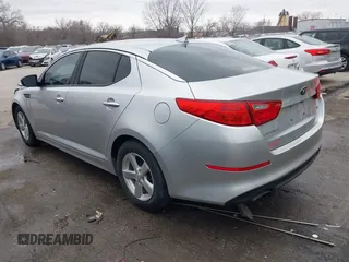 2014 Kia Optima LX z VIN KNAGM4A74E5476622, wystawiony jako IAAI lot #41701835 z przebiegiem 193 086 mil mil oraz . Historia ofert i sprzedaży dostępna na DreamBid. Obrazek 3.