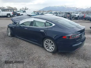 2015 Tesla Model S 85D with VIN 5YJSA1H23FFP79020, listed as a IAAI auction lot 41819392 with Not Provided miles. Bid and sale history available at carsss.com. Image 3.
