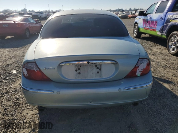2003 Jaguar S-Type with VIN SAJEA01T93FM46260, listed as a Copart auction lot 87573835 with 129,563 mi miles and Clean Title. Bid and sale history available at DreamBid. Image 6.