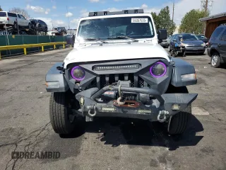 2018 Jeep Wrangler Unlimited Sport S with VIN 1C4HJXDN9JW279137, listed as a Copart auction lot 55357535 with 72,104 mi miles and Salvage title. Bid and sale history available at DreamBid. Image 5.