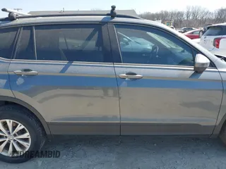 2018 Volkswagen Tiguan S with VIN 3VV0B7AX7JM104662, listed as a IAAI auction lot 41781658 with 235,461 mi miles and . Bid and sale history available at DreamBid. Image 14.