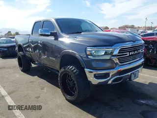 2020 Ram 1500 Laramie with VIN 1C6SRFDT6LN280138, listed as a IAAI auction lot 41510456 with 71,110 mi miles and . Bid and sale history available at DreamBid. Image 1.