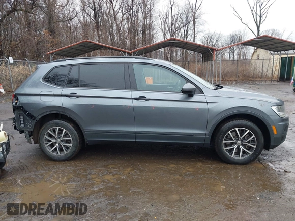 2021 Volkswagen Tiguan S with VIN 3VV0B7AX3MM026708, listed as a IAAI auction lot 41527399 with 80,061 mi miles and . Bid and sale history available at DreamBid. Image 14.