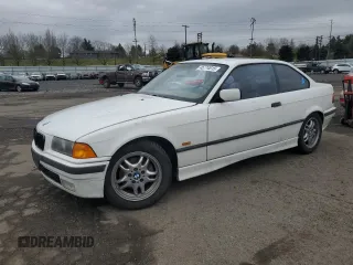 1997 BMW 3 Series 328is with VIN WBABG132XVET04869, listed as a Copart auction lot 45774015 with 123,280 mi miles and Salvage Title. Bid and sale history available at carsss.com. Image 1.