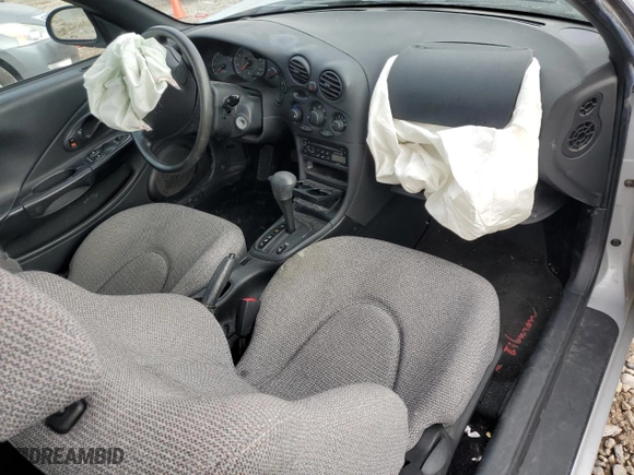 1999 Hyundai Tiburon with VIN KMHJG24F8XU126762, listed as a Copart auction lot 88747725 with 51,296 mi miles and Salvage Title. Bid and sale history available at carsss.com. Image 8.