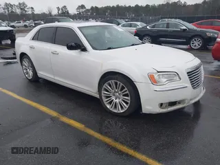 2014 Chrysler 300 with VIN 2C3CCAEG1EH380389, listed as a IAAI auction lot 41544101 with 186,314 mi miles. Bid and sale history available at carsss.com. Image 1.