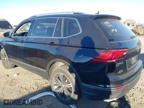 2018 Volkswagen Tiguan SEL with VIN 3VV3B7AX7JM117053, listed as a IAAI auction lot 40827695 with 71,489 mi miles and . Bid and sale history available at DreamBid. Image 3.