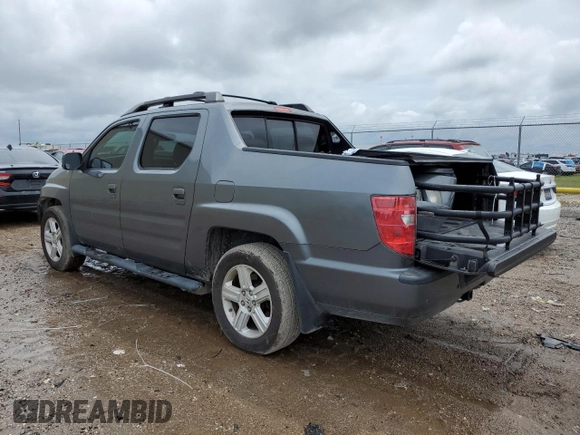 2011 Honda Ridgeline RTL with VIN 5FPYK1F52BB009042, listed as a Copart auction lot 69439004 with 119,889 mi miles and Salvage Title. Bid and sale history available at carsss.com. Image 2.