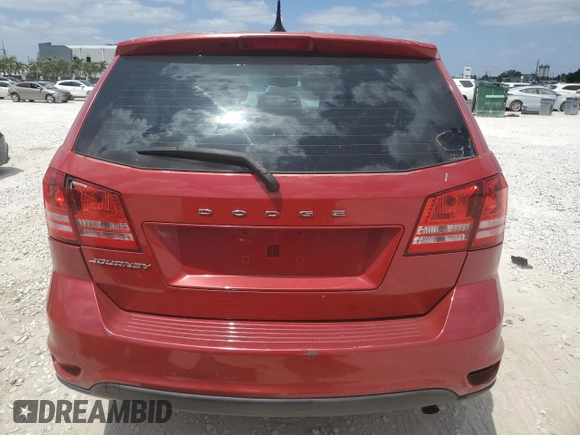 2014 Dodge Journey American Value with VIN 3C4PDCAB2ET287789, listed as a Copart auction lot 55257035 with 90,998 mi miles and Salvage Title. Bid and sale history available at DreamBid. Image 6.