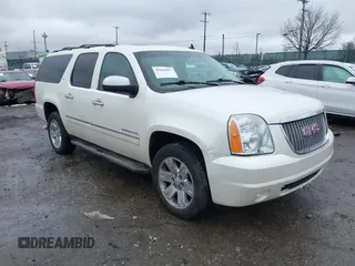 2012 GMC Yukon XL SLT with VIN 1GKS2KE77CR205341, listed as a IAAI auction lot 41565367 with 165,500 mi miles. Bid and sale history available at carsss.com. Image 1.