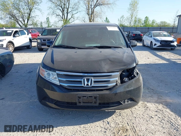 2012 Honda Odyssey EX-L with VIN 5FNRL5H6XCB016801, listed as a IAAI auction lot 42112141 with 164,671 mi miles and . Bid and sale history available at carsss.com. Image 12.