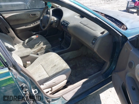 1999 Acura Integra LS with VIN JH4DB7658XS002311, listed as a IAAI auction lot 41697843 with 235,682 mi miles and . Bid and sale history available at DreamBid. Image 5.