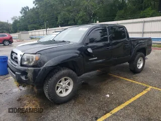 2008 Toyota Tacoma PreRunner with VIN 3TMJU62NX8M055181, listed as a Copart auction lot 62948595 with 245,978 mi miles and Salvage title. Bid and sale history available at DreamBid. Image 1.