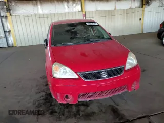2005 Suzuki Aerio S z VIN JS2RA62S555256527, wystawiony jako Copart lot #86038284 z przebiegiem 135 296 mil mil oraz Szkoda całkowita • Salvage title. Historia ofert i sprzedaży dostępna na DreamBid. Obrazek 11.