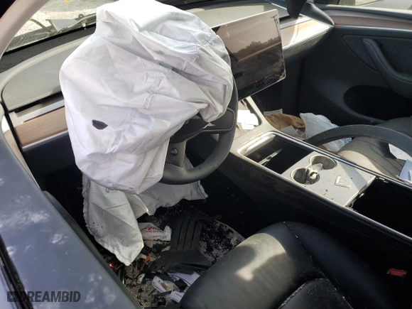 2024 Tesla Model Y with VIN 7SAYGDED6RF112689, listed as a Copart auction lot 50763815 with 11,933 mi miles and Salvage Title. Bid and sale history available at carsss.com. Image 8.