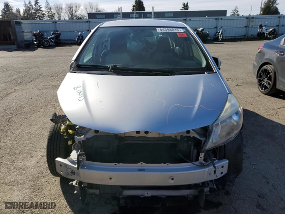 2012 Toyota Yaris L with VIN JTDKTUD30CD516562, listed as a Copart auction lot 44598815 with 127,859 mi miles and Salvage Title. Bid and sale history available at carsss.com. Image 5.