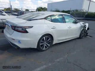 2021 Nissan Maxima SV with VIN 1N4AA6CV9MC501006, listed as a IAAI auction lot 40619654 with 92,851 mi miles. Bid and sale history available at carsss.com. Image 4.