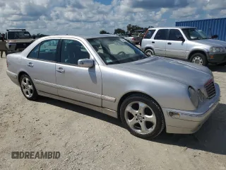 2002 Mercedes-Benz E-Class with VIN WDBJF65J02B495961, listed as a Copart auction lot 73844554 with 99,380 mi miles and Salvage Title. Bid and sale history available at carsss.com. Image 4.