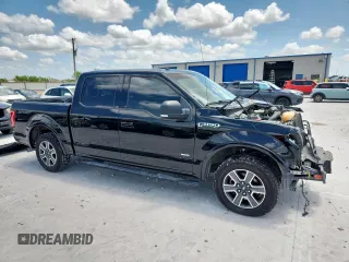 2016 Ford F-150 XL with VIN 1FTEW1CP5GKF31048, listed as a Copart auction lot 61764705 with 162,457 mi miles and Salvage title. Bid and sale history available at DreamBid. Image 4.