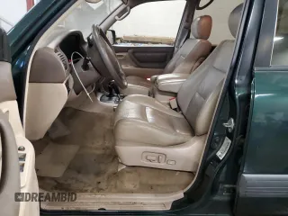 1998 Toyota Land Cruiser with VIN JT3HT05J2W0017309, listed as a Copart auction lot 87882155 with 191,581 mi miles and Salvage Title. Bid and sale history available at carsss.com. Image 7.