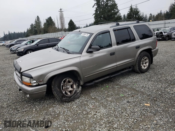 2000 Dodge Durango with VIN 1B4HS28Z6YF121861, listed as a Copart auction lot 87669175 with 115,990 mi miles and Salvage Title. Bid and sale history available at DreamBid. Image 1.