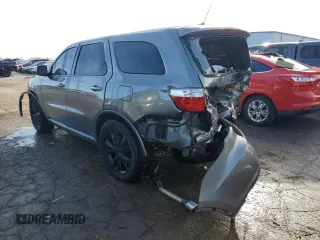 2012 Dodge Durango R/T with VIN 1C4SDHCT3CC188243, listed as a Copart auction lot 40917114 with 145,409 mi miles and Salvage title. Bid and sale history available at DreamBid. Image 2.