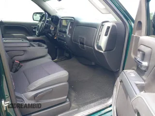 2014 Chevrolet Silverado 1500 LT with VIN 1GCRCREH2EZ323115, listed as a IAAI auction lot 42055949 with 61,337 mi miles and . Bid and sale history available at DreamBid. Image 5.