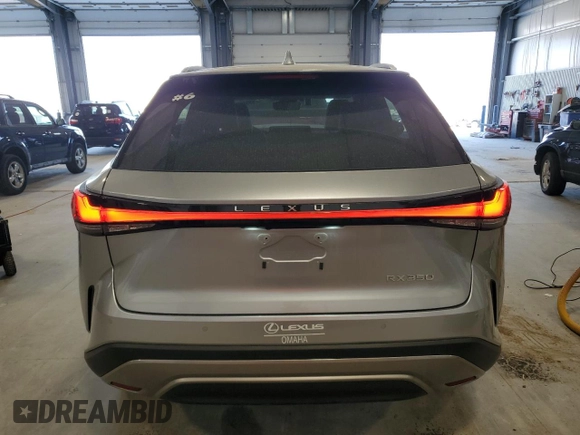 2024 Lexus RX with VIN 2T2BAMBA1RC042761, listed as a Copart auction lot 53048535 with 6,936 mi miles and Salvage Title. Bid and sale history available at carsss.com. Image 6.