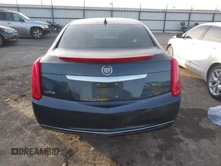 2013 Cadillac XTS with VIN 2G61N5S34D9231315, listed as a IAAI auction lot 41092660 with 206,093 mi miles. Bid and sale history available at carsss.com. Image 16.