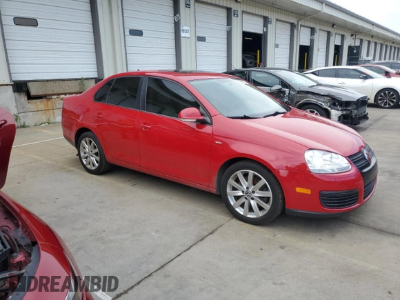 2010 Volkswagen Jetta Wolfsburg Edition with VIN 3VWRJ7AJXAM154666, listed as a Copart auction lot 60556875 with 149,509 mi miles and Salvage title. Bid and sale history available at DreamBid. Image 4.