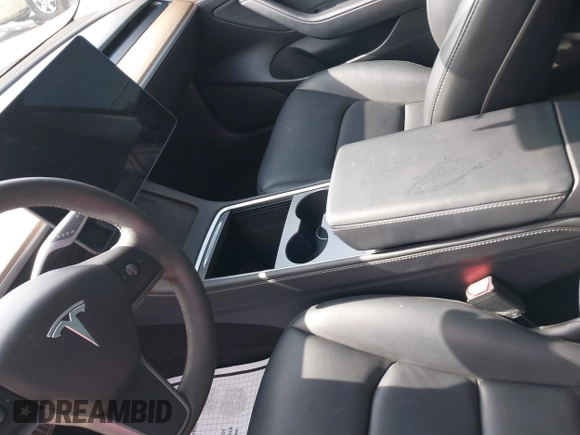 2023 Tesla Model 3 с VIN 5YJ3E1EA0PF589066, выставлен на аукционе IAAI как лот 42508495 с пробегом Не указан миль и . История ставок и продаж доступна на DreamBid. Изображение 19.