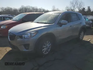 2015 Mazda CX-5 Touring with VIN JM3KE4CY5F0506569, listed as a Copart auction lot 49441035 with 160,077 mi miles and Salvage Title. Bid and sale history available at DreamBid. Image 1.