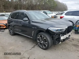 2023 BMW X5 xDrive45e with VIN 5UXTA6C07P9P29044, listed as a Copart auction lot 43625165 with 33,578 mi miles and Salvage Title. Bid and sale history available at carsss.com. Image 4.