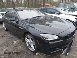 2014 BMW 6 Series 650i with VIN WBA6B2C55ED129162, listed as a IAAI auction lot 41917771 with 100,452 mi miles and . Bid and sale history available at carsss.com. Image 1.