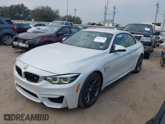 2018 BMW M4 with VIN WBS4Z9C55JED30963, listed as a IAAI auction lot 41641751 with 34,543 mi miles and . Bid and sale history available at DreamBid. Image 2.