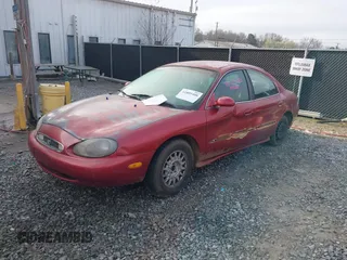 1998 Mercury Sable GS with VIN 1MEFM50U9WA605604, listed as a IAAI auction lot 41809408 with 142,175 mi miles and . Bid and sale history available at DreamBid. Image 2.