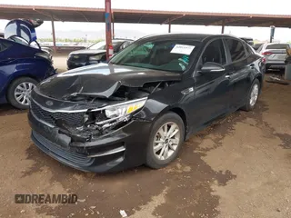 2016 Kia Optima LX with VIN KNAGT4L32G5111503, listed as a IAAI auction lot 42011975 with 114,476 mi miles. Bid and sale history available at carsss.com. Image 2.