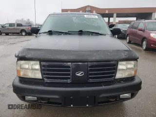 2000 Oldsmobile Bravada z VIN 1GHDT13W5Y2311819, wystawiony jako Copart lot #44839145 z przebiegiem 163 427 mil mil oraz Tytuł czysty. Historia ofert i sprzedaży dostępna na DreamBid. Obrazek 5.