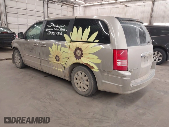 2009 Chrysler Town & Country LX with VIN 2A8HR44E79R683493, listed as a IAAI auction lot 42056729 with 147,227 mi miles. Bid and sale history available at carsss.com. Image 3.
