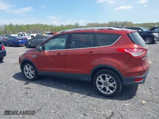 2015 Ford Escape Titanium with VIN 1FMCU0JX5FUB77475, listed as a IAAI auction lot 42103388 with 113,018 mi miles. Bid and sale history available at carsss.com. Image 14.
