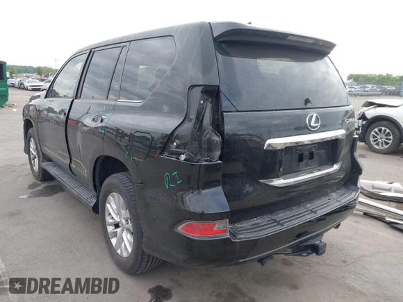 2014 Lexus GX with VIN JTJBM7FX0E5069997, listed as a IAAI auction lot 42076860 with 122,800 mi miles. Bid and sale history available at carsss.com. Image 3.
