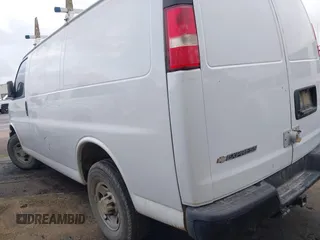 2017 Chevrolet Express Cargo Van with VIN 1GCWGAFF6H1176404, listed as a IAAI auction lot 42014572 with 104,378 mi miles. Bid and sale history available at carsss.com. Image 3.