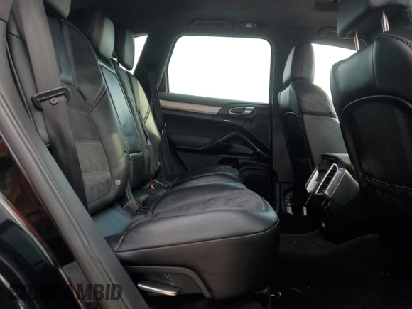 2013 Porsche Cayenne GTS с VIN WP1AD2A29DLA72323, выставлен на аукционе Copart как лот 52990885 с пробегом 100 812 миль миль и Списание • Salvage title. История ставок и продаж доступна на DreamBid. Изображение 11.