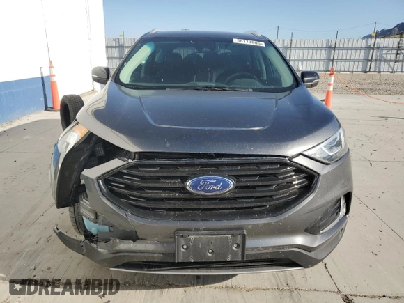 2020 Ford Edge SEL z VIN 2FMPK4J97LBA46310, wystawiony jako Copart lot #56177805 z przebiegiem 97 180 mil mil oraz Szkoda całkowita • Salvage title. Historia ofert i sprzedaży dostępna na DreamBid. Obrazek 5.