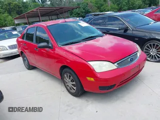 2005 Ford Focus S z VIN 1FAFP34N65W165817, wystawiony jako IAAI lot #42218809 z przebiegiem 191 324 mil mil oraz . Historia ofert i sprzedaży dostępna na DreamBid. Obrazek 1.