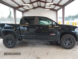 2022 Chevrolet Colorado 4WD Z71 z VIN 1GCGTDEN7N1244585, wystawiony jako IAAI lot #41625980 z przebiegiem 21 210 mil mil oraz . Historia ofert i sprzedaży dostępna na DreamBid. Obrazek 13.